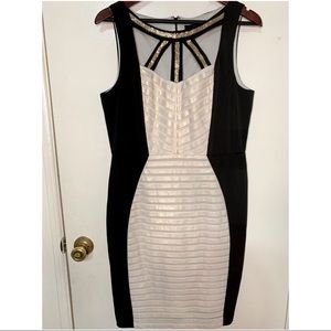 Sangria pencil black dress with cut out neck design